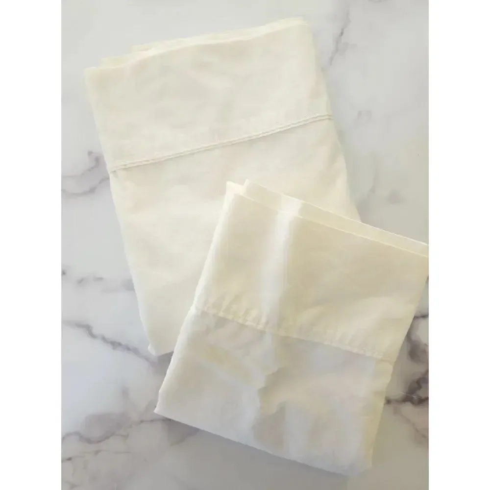 JcPenny home twin flat sheet cream and 1 swiss dot textured pillowcase sham